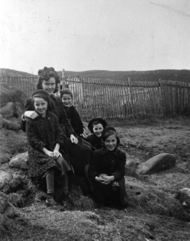027: Cede McCarthy with four young pupils. l-r Betty Ennis, Gwen Carroll, Angela Ryan, Marie Ryan. (circa 1943)- Betty daughter of Vincent Ennis &amp;amp; Min Carroll; Gwen daughter of Michael Carroll &amp;amp; Josie Barry; Angela daughter of Michael Ryan &amp;amp; Petronella Whelan; Marie daughter of Joseph Ryan &amp;amp; Ursula Barry.